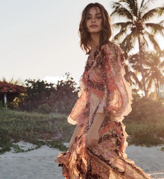 Young woman in a beach dress