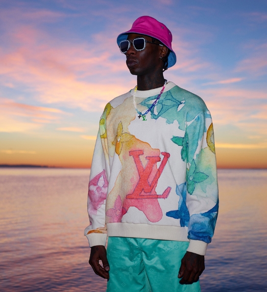 Man in colourful outfit with colourful prints