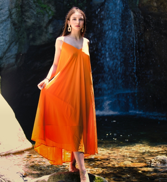 Woman in a bright orange dress